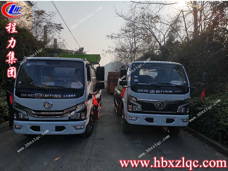 湖北程力東風(fēng)多利卡餐廚垃圾車和東風(fēng)福瑞卡灑水車順利發(fā)往湖南郴州客戶所在地